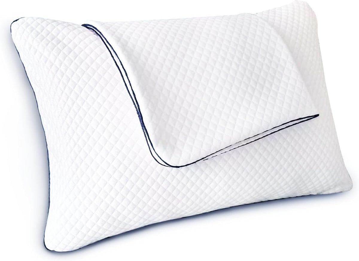 A white contoured pillow with a diamond-quilted texture and dark blue piping along the edges, shown on a plain white background.